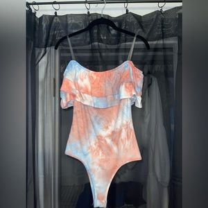 Women’s body suit, great condition and never worn. Very soft material